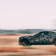 A profile photo of a Rolls Royce Spectre EV.